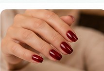 Imagem ilustrativa de unhas vermelhas
